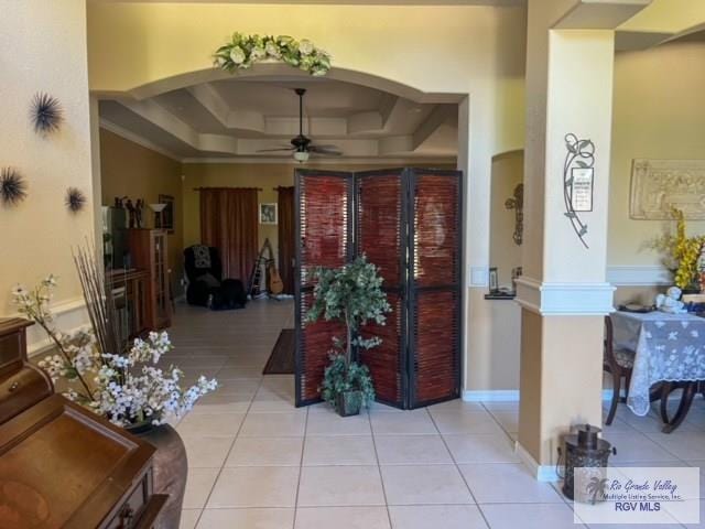 5303 Rustic Manor Dr, Brownsville, TX 78526 - interior space with arched walkways, a raised ceiling, ceiling fan, and light tile patterned flooring