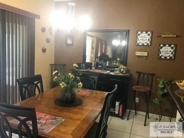 5303 Rustic Manor Dr, Brownsville, TX 78526 - dining area featuring tile patterned floors