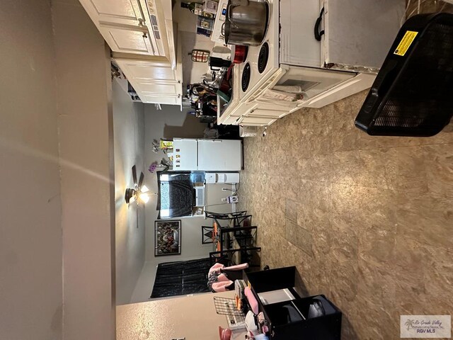 kitchen with white cabinets