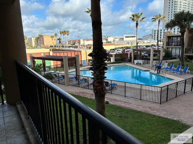 view of swimming pool featuring a patio