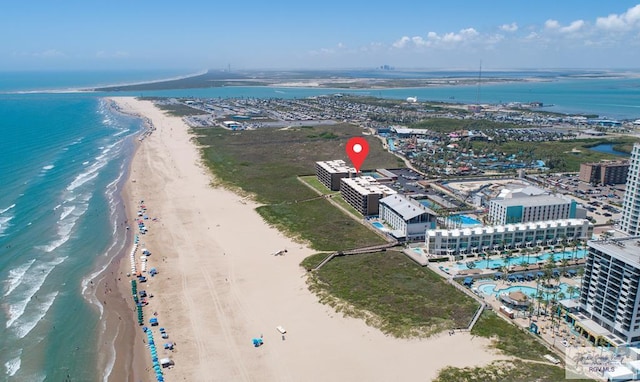 aerial view featuring a water view and a beach view