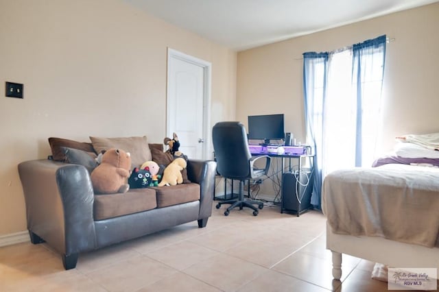 bedroom featuring light tile patterned floors