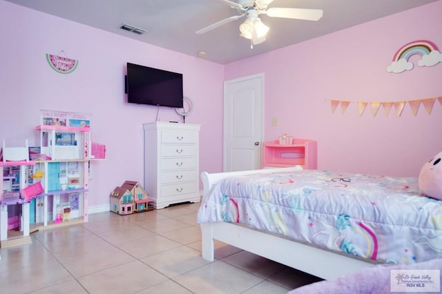 bedroom featuring tile patterned floors and ceiling fan