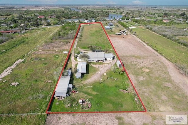 birds eye view of property featuring a rural view