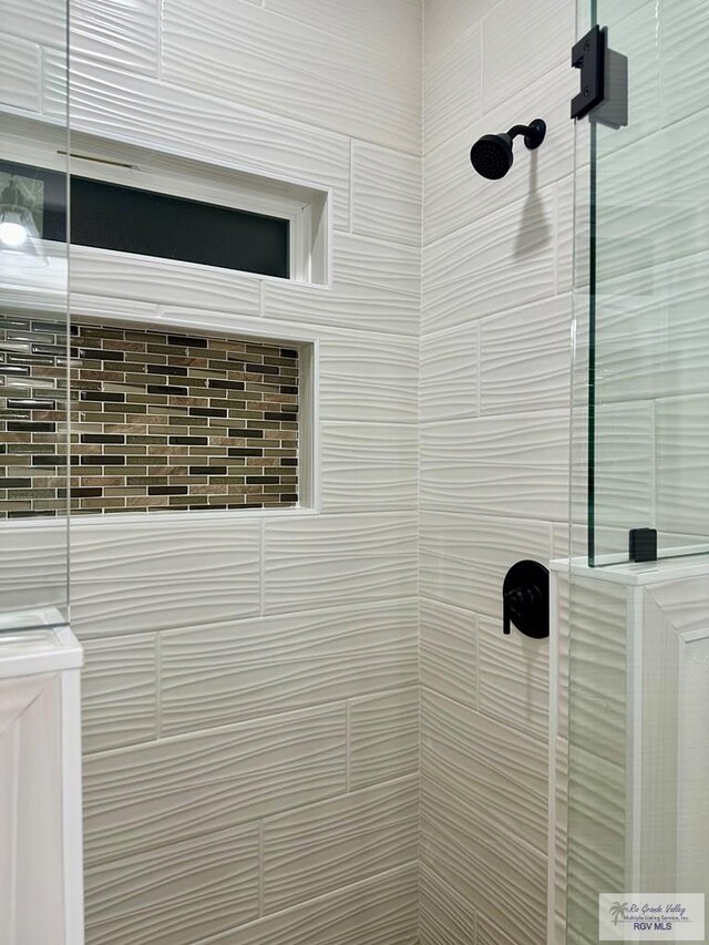 1521 Stirrup Cir, San Benito, TX 78586 - bathroom view of a tile shower