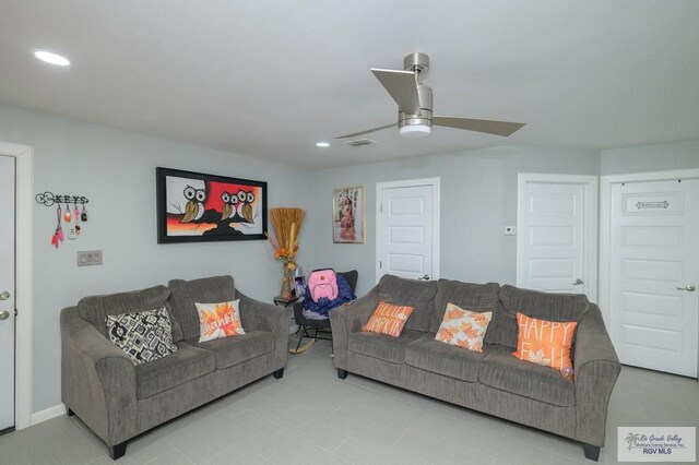 living room featuring ceiling fan