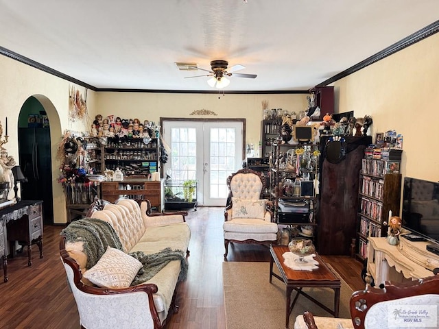 living room featuring ceiling fan, crown molding, dark wood-type flooring, and french doors