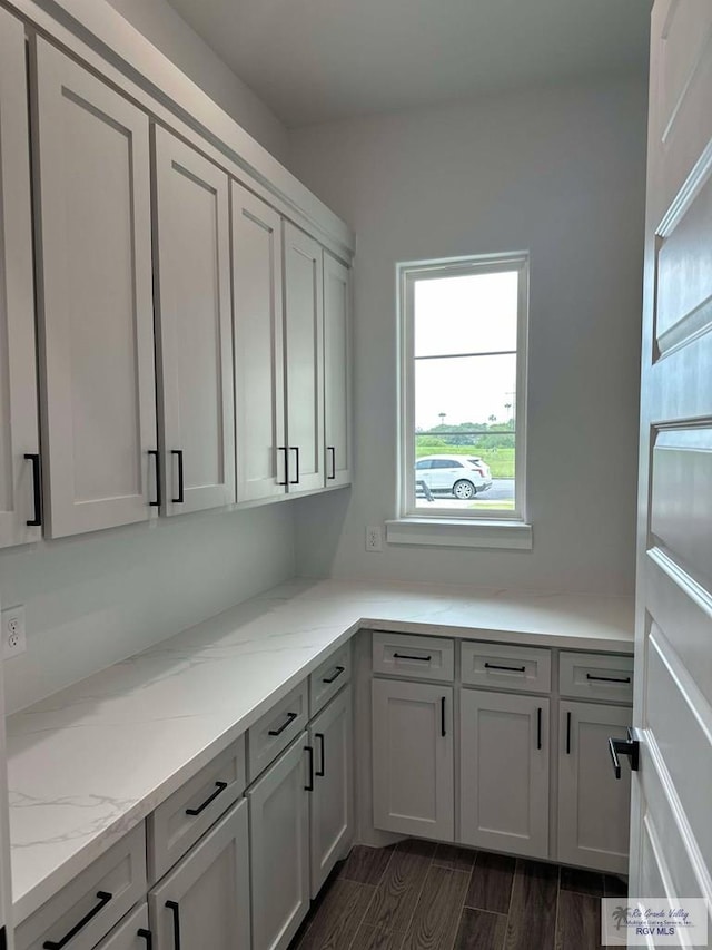 3518 Treasure Hills Blvd, Harlingen, TX 78550 - laundry area with dark wood-style flooring