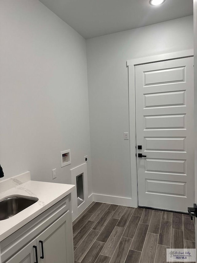 3518 Treasure Hills Blvd, Harlingen, TX 78550 - laundry area with cabinet space, electric dryer hookup, washer hookup, dark wood-style floors, and recessed lighting