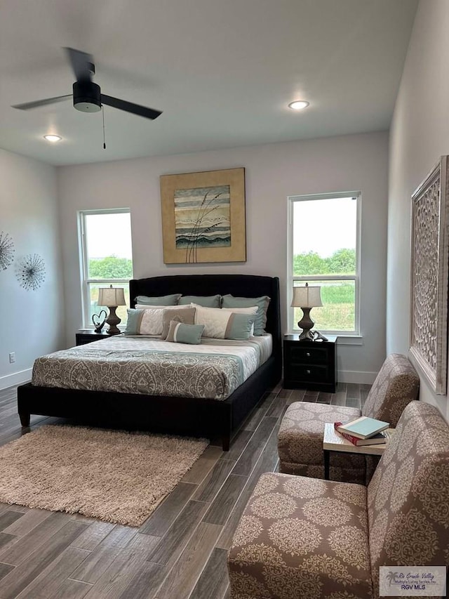 3518 Treasure Hills Blvd, Harlingen, TX 78550 - bedroom featuring multiple windows, dark wood-type flooring, ceiling fan, and recessed lighting