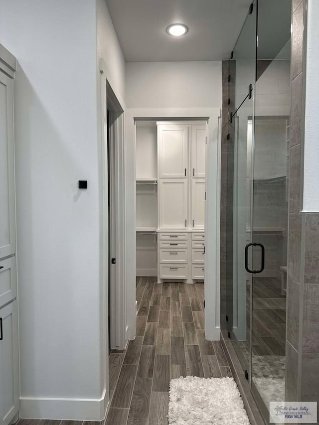 3518 Treasure Hills Blvd, Harlingen, TX 78550 - full bath featuring a shower stall, wood tiled floors, a walk in closet, and recessed lighting