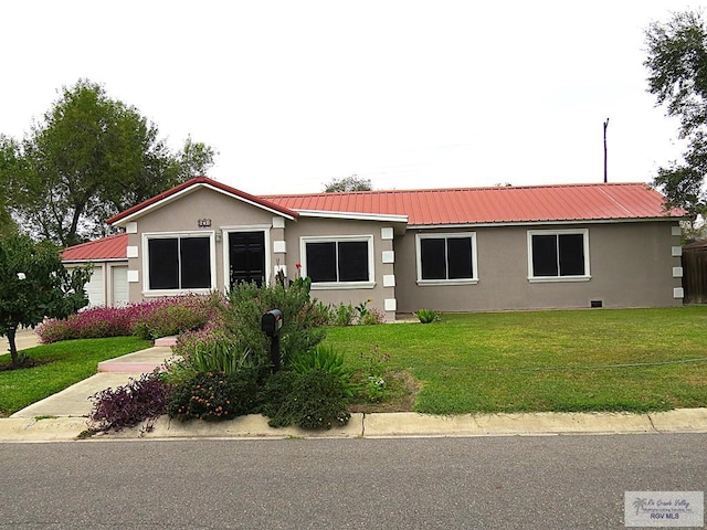 view of front facade with a front lawn