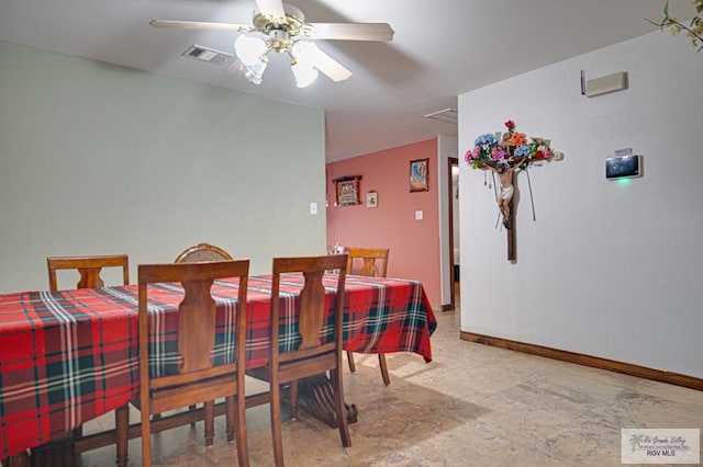 dining area with ceiling fan