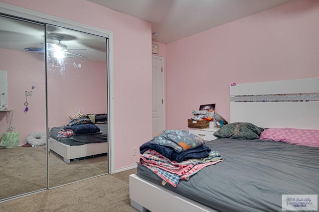 carpeted bedroom featuring a closet