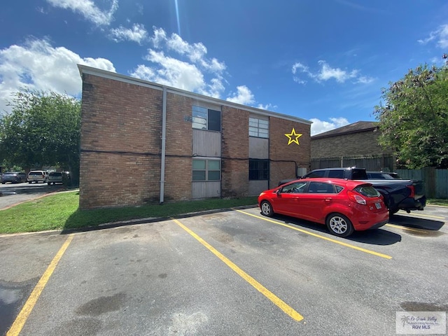 2304 Shidler Dr Unit 10-40, Brownsville, TX 78521 - view of building exterior featuring uncovered parking
