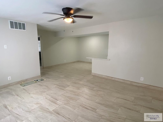 2304 Shidler Dr Unit 10-40, Brownsville, TX 78521 - empty room with a ceiling fan and baseboards