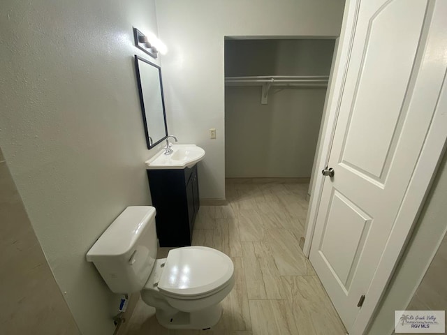 2304 Shidler Dr Unit 10-40, Brownsville, TX 78521 - bathroom with vanity and toilet