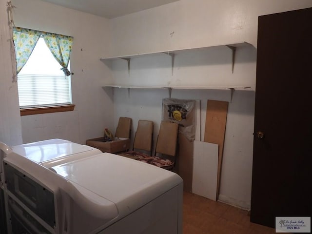 55 Carlton Dr, Brownsville, TX 78521 - laundry area with separate washer and dryer and wood finished floors