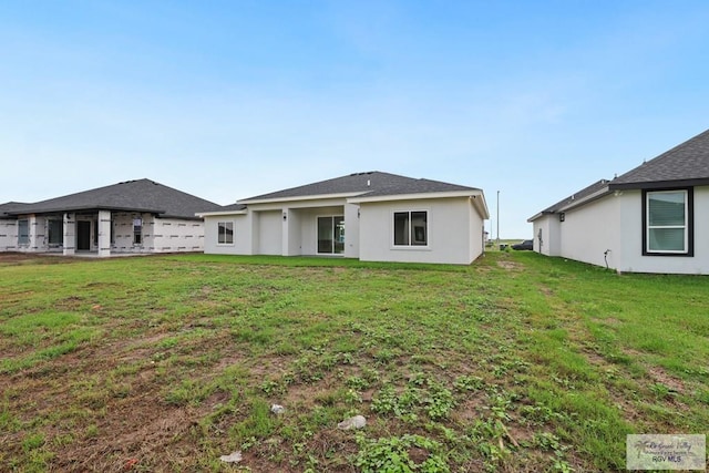 516 Eagle Dr, Los Fresnos, TX 78566 - back of property with a yard