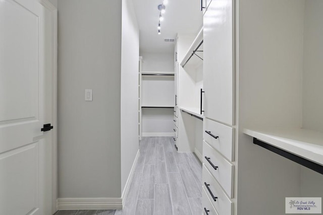 516 Eagle Dr, Los Fresnos, TX 78566 - walk in closet featuring light wood-type flooring