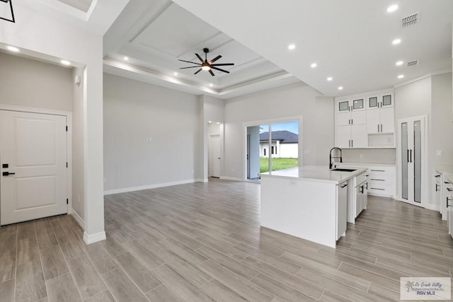 516 Eagle Dr, Los Fresnos, TX 78566 - kitchen with recessed lighting, light countertops, visible vents, a sink, and open floor plan