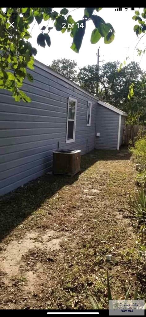 view of home's exterior featuring central AC unit