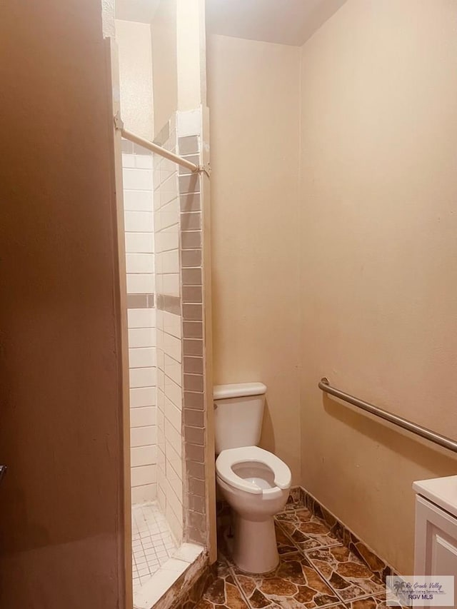 144 N St, Brownsville, TX 78521 - full bathroom with a stall shower and toilet