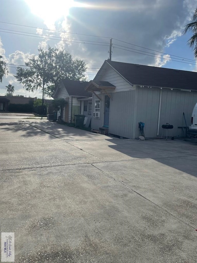 144 N St, Brownsville, TX 78521 - view of front of home featuring concrete driveway