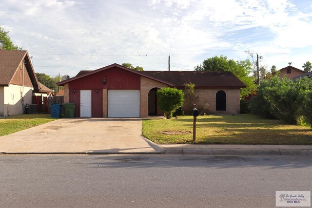 single story home featuring a garage, central air condition unit, and a front lawn