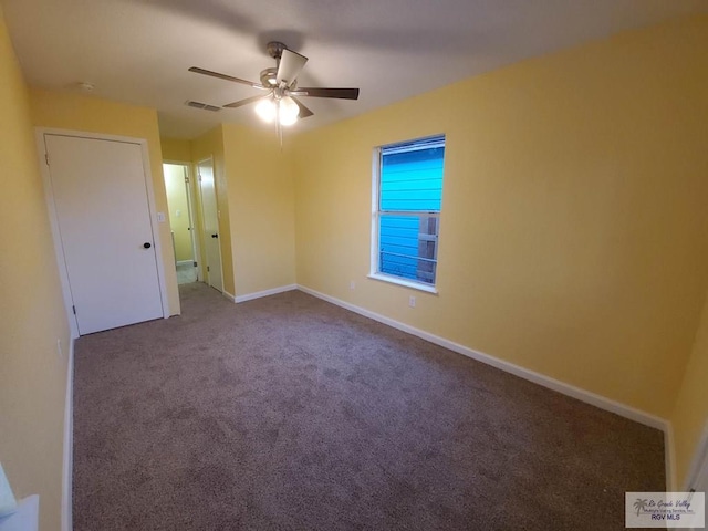 608 W Polk St, Harlingen, TX 78550 - unfurnished room featuring carpet flooring, baseboards, visible vents, and ceiling fan