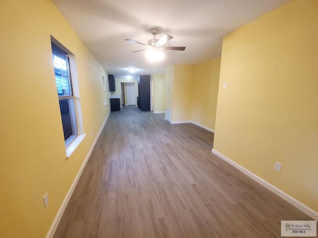 608 W Polk St, Harlingen, TX 78550 - interior space with baseboards and wood finished floors