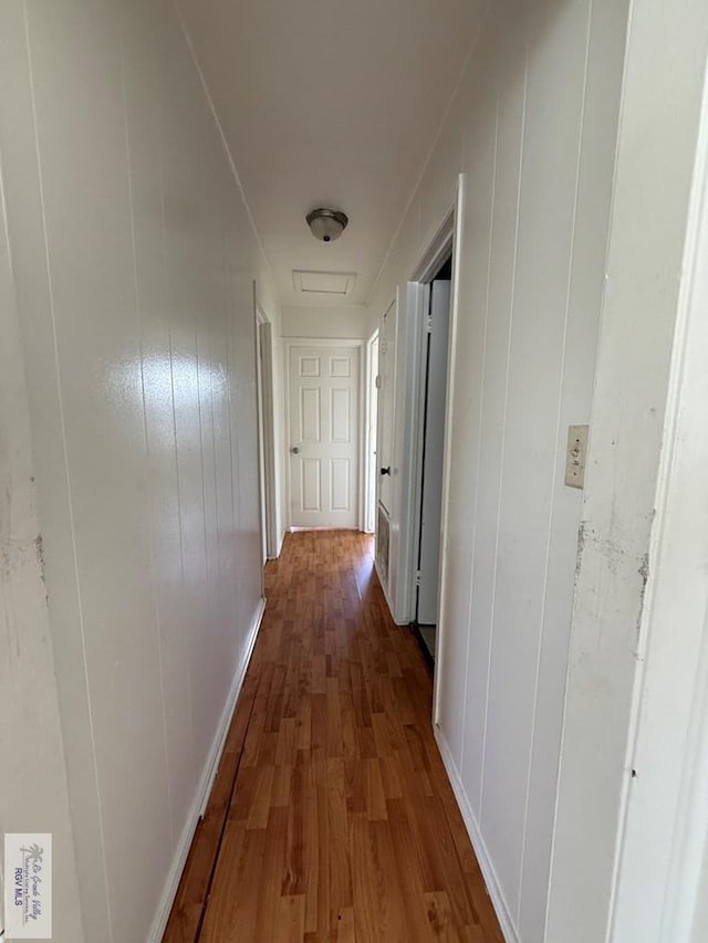 1206 S C St, Harlingen, TX 78550 - hall with wood finished floors and baseboards