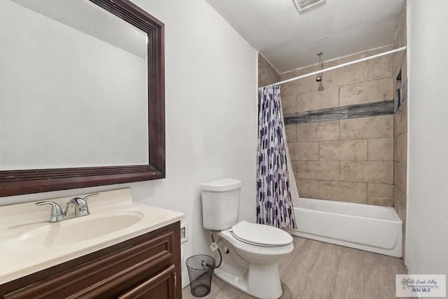 full bathroom featuring shower / bathtub combination with curtain, vanity, toilet, and wood-type flooring