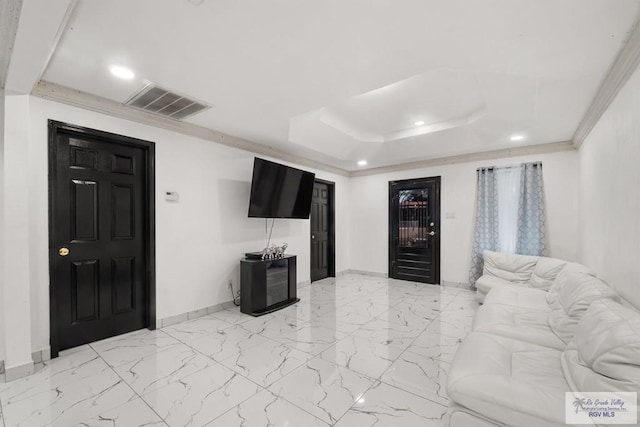 living room with ornamental molding