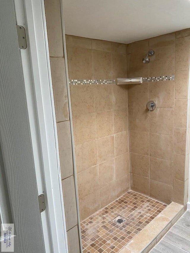 417 SE Verbena Ln Unit 23, La Feria, TX 78559 - full bath with a shower stall and wood finished floors