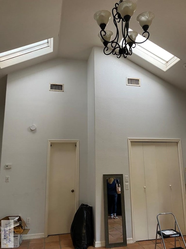 417 SE Verbena Ln Unit 23, La Feria, TX 78559 - detailed view of a skylight, a chandelier, and a smoke detector