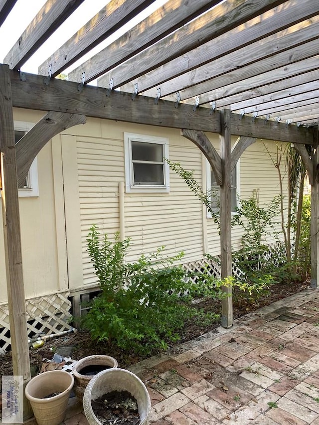 417 SE Verbena Ln Unit 23, La Feria, TX 78559 - view of patio / terrace featuring a pergola