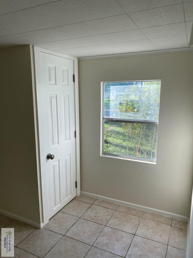 417 SE Verbena Ln Unit 23, La Feria, TX 78559 - unfurnished room with baseboards and light tile patterned floors