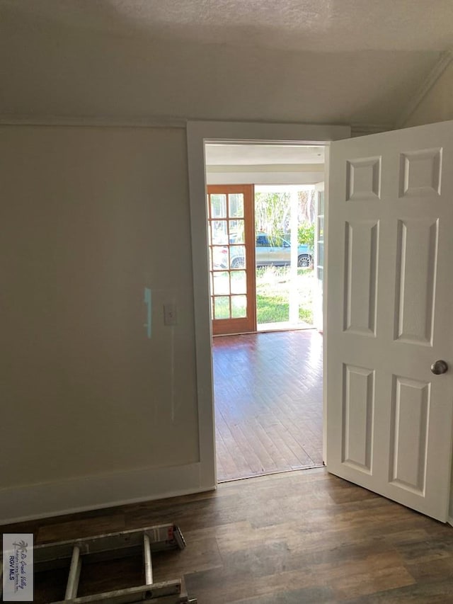 417 SE Verbena Ln Unit 23, La Feria, TX 78559 - hallway featuring dark wood finished floors