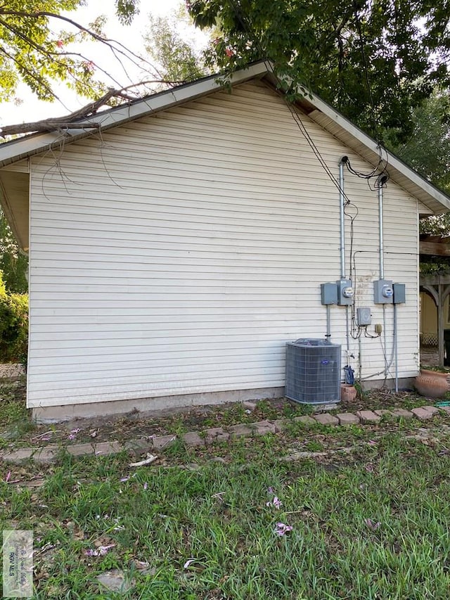 417 SE Verbena Ln Unit 23, La Feria, TX 78559 - view of side of home with central air condition unit