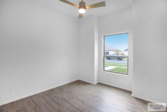 unfurnished room featuring ceiling fan and light hardwood / wood-style flooring