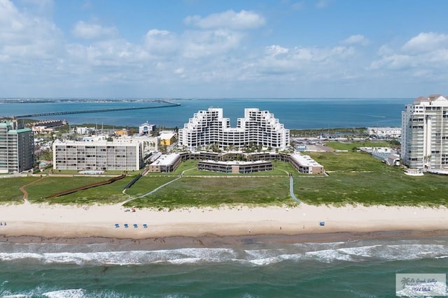 aerial view featuring a beach view, a view of city, and a water view