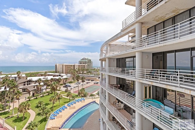 balcony featuring a water view