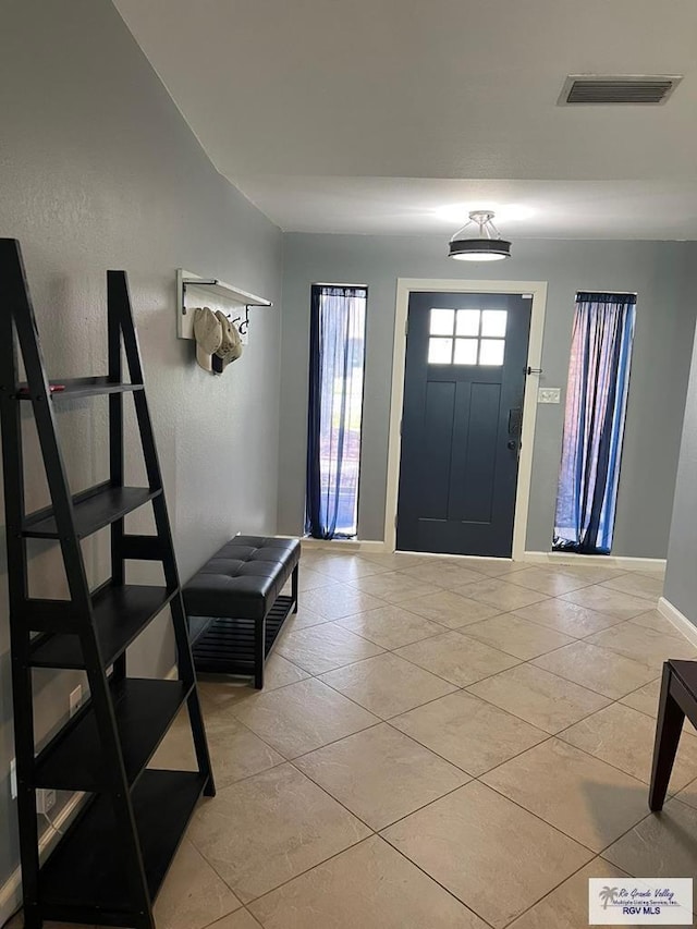 1001 Tesoro Ave, Rancho Viejo, TX 78575 - foyer entrance with baseboards and light tile patterned floors