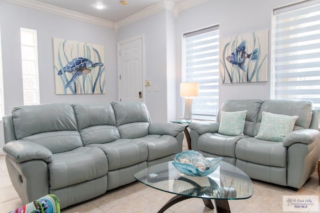 living room featuring ornamental molding and light tile patterned flooring