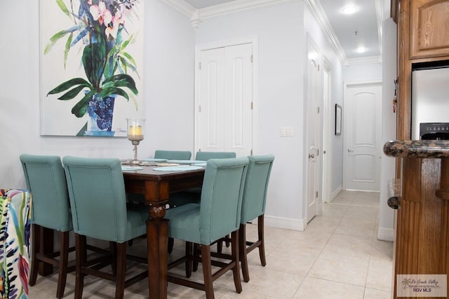 tiled dining space with ornamental molding