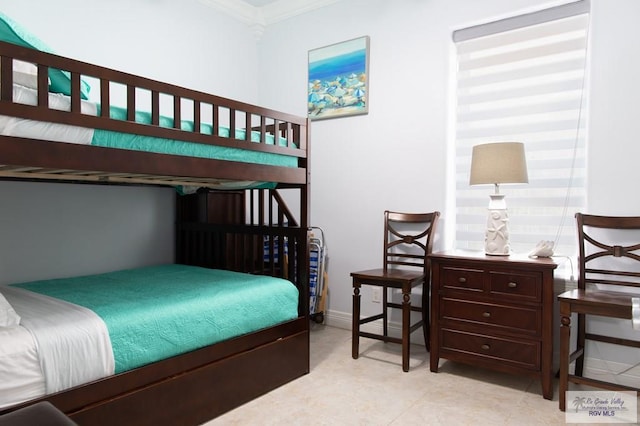 bedroom featuring crown molding