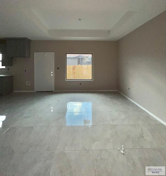 unfurnished living room featuring a textured ceiling