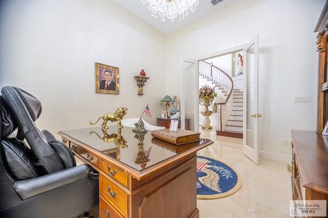 office space featuring a notable chandelier, light tile patterned floors, and french doors