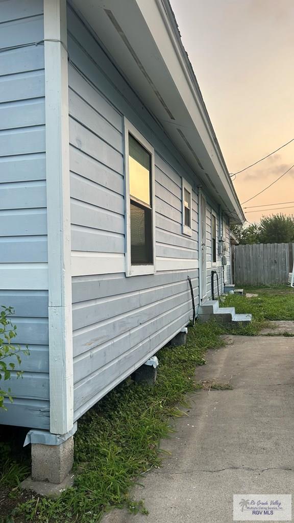 view of property exterior at dusk